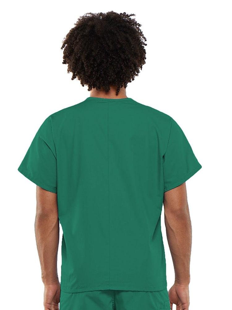 A young male Clinical Laboratory Technician wearing a Cherokee Workwear Originals Unisex Single Pocket V-neck Scrub Top in Surgical Green size Large featuring a center back length of 27.5".