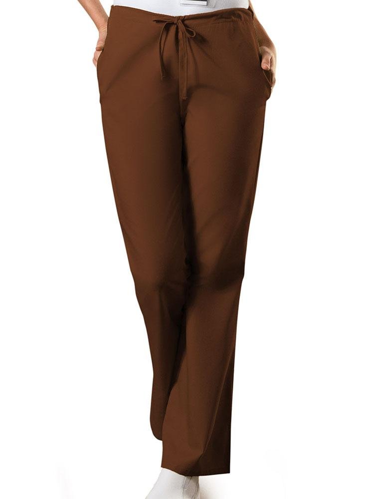 A young female LPN wearing a Cherokee Workwear Originals Women's Drawstring Flare Leg Scrub Pant in Chocolate size Medium Tall featuring a Modern Classic fit.