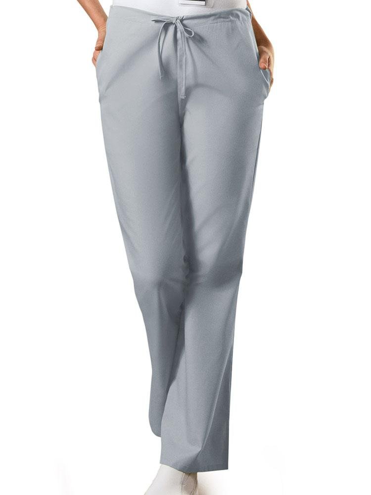 A young female Nursing Assistant wearing a Cherokee Workwear Originals Women's Drawstring Flare Leg Scrub Pant in Grey  size Large Tall featuring a Modern Classic fit.