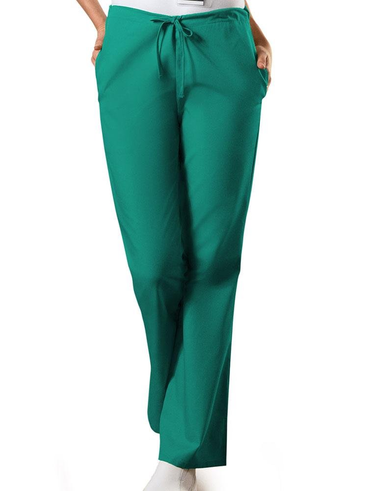 A young female Nursing Assistant wearing a Cherokee Workwear Originals Women's Drawstring Flare Leg Scrub Pant in Surgical Green  size XS Petite featuring a Modern Classic fit.