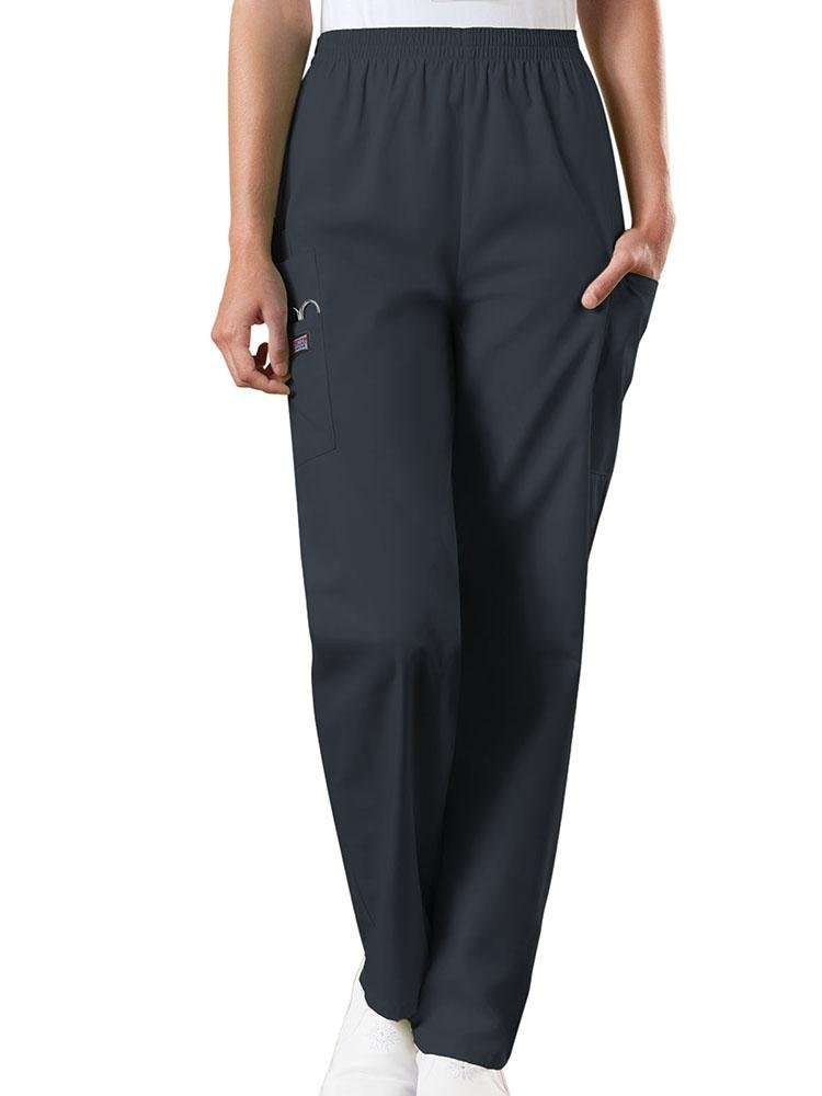 A young female Emergency Medical Technician wearing a Cherokee Workwear Originals Women's Natural Rise Tapered Pull-On Scrub Pant in Pewter size Large Petite featuring an elastic waist.