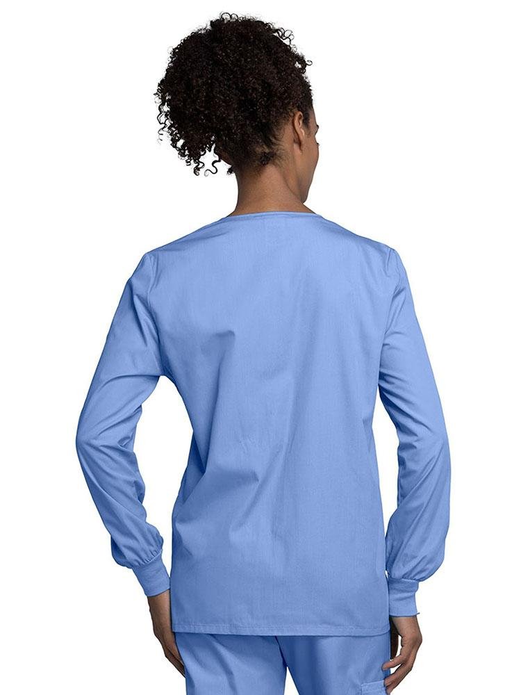 A view of the back of the Cherokee Workwear Originals Women's Snap Front Warm-Up Jacket in Ceil size 4XL featuring a center back length of approximately 27.5".