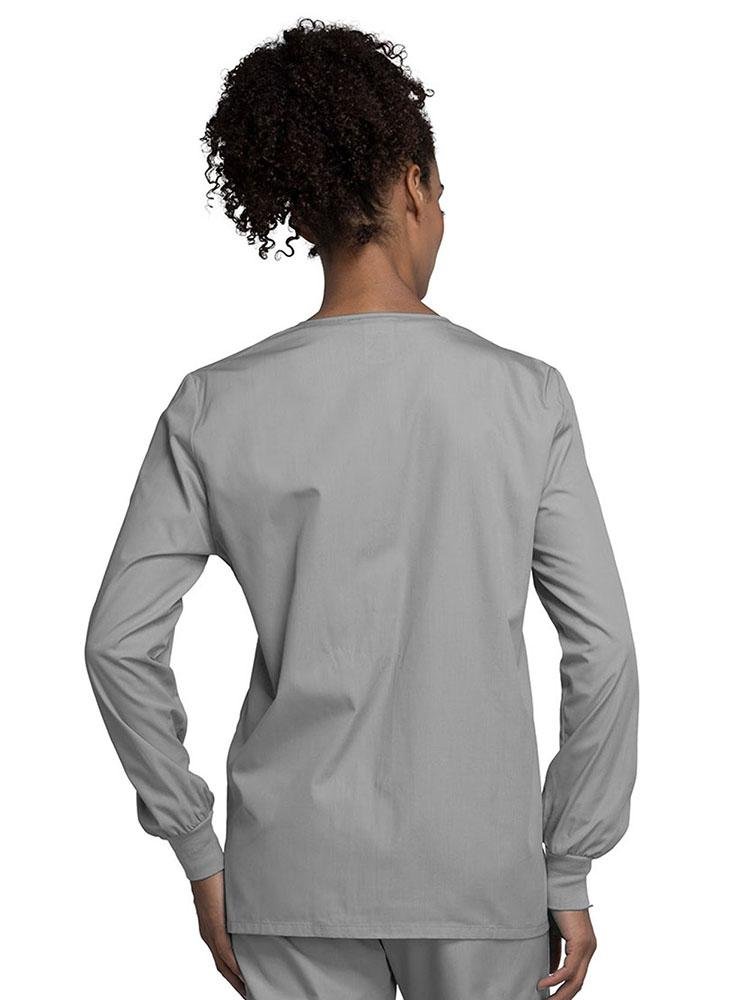 A view of the back of a Cherokee Workwear Originals Women's Snap Front Warm-Up Jacket in Grey style 4350 featuring a center back length of 27.5"