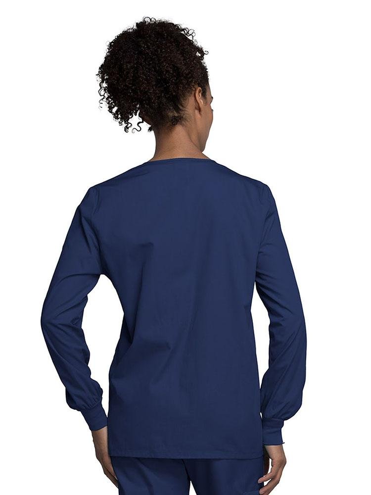 A view of the back of the Cherokee Workwear Originals Women's Snap Front Warm-Up Jacket in Navy style 4350 featuring a center back length of approximately 27.5".