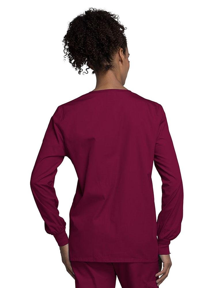 A view of the back of the Cherokee Workwear Originals Women's Snap Front Warm-Up Jacket in Wine style 4350 featuring a center back length of approximately 27.5".