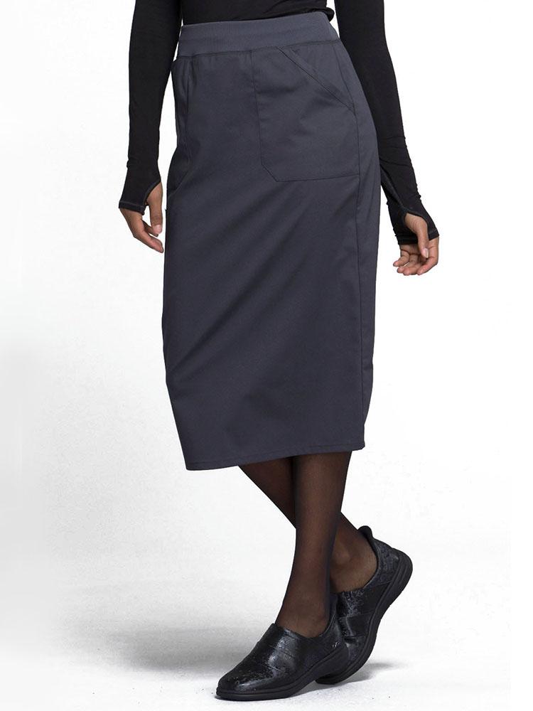 Side view of Physician wearing Cherokee Worwear Professionals women's 30" Knit Waistband Scrub Skirt  in pewter size 5X