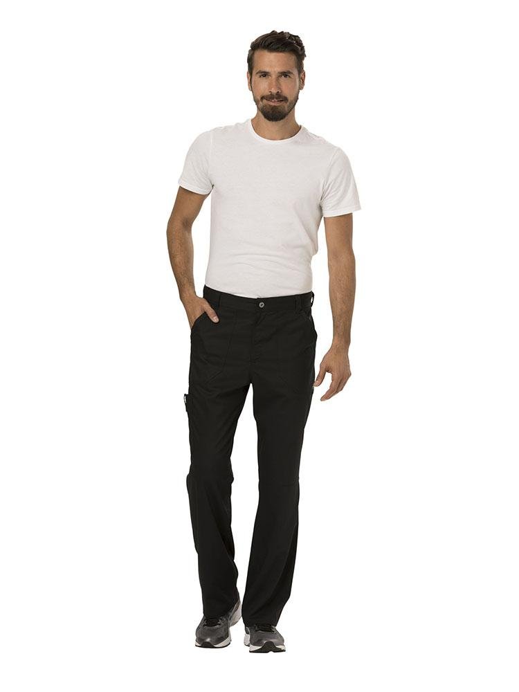 A male Lab Tech wearing a Cherokee Workwear Revolution Men's Drawstring Cargo Scrub Pant in Black size Medium featuring a total of 5 pockets.