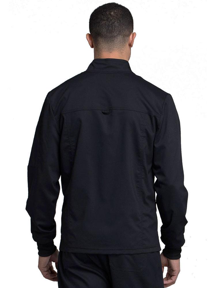 Back view of Medical Secretary wearing Cherokee Workwear Revolution men's Zip Front Scrub Jacket in black size medium