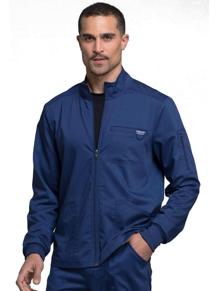 Imaging Technologist wearing Cherokee Workwear Revolution men's Zip Front Scrub Jacket in navy size extra large