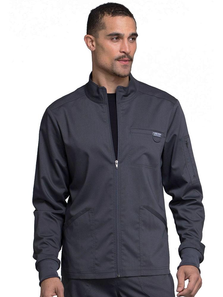 Nurse Anesthetist wearing Cherokee Workwear Revolution men's Zip Front Scrub Jacket in pewter size medium