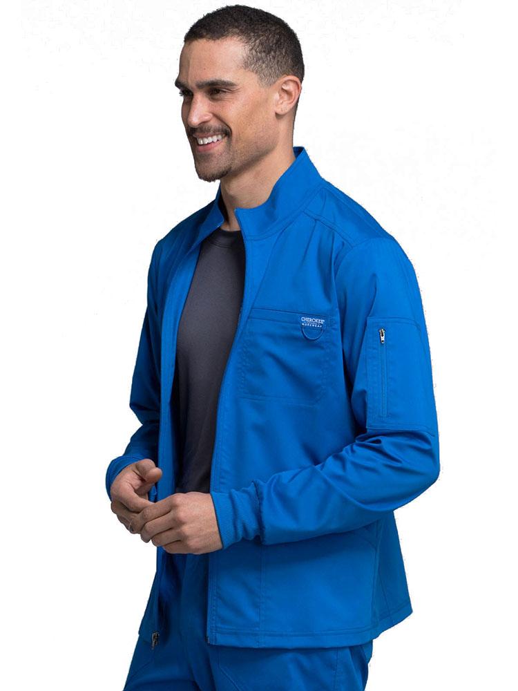 Optometrist wearing Cherokee Workwear Revolution men's Zip Front Scrub Jacket in royal size medium
