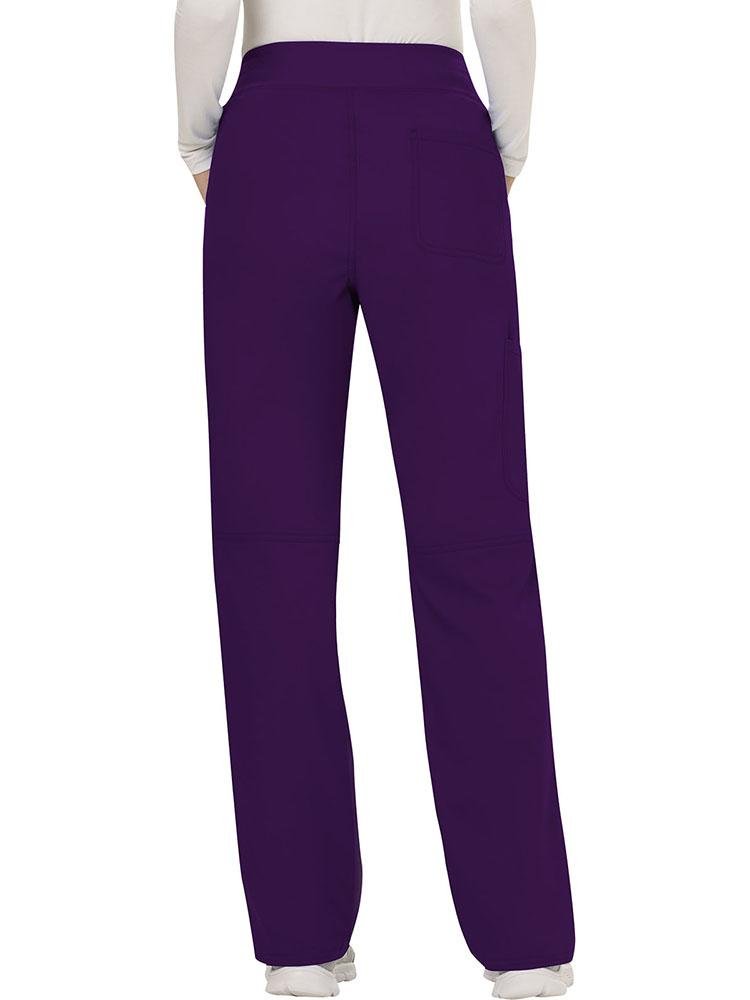 Back view of a Nurse Practitioner wearing Cherokee Workwear Revolution women's Elastic Waistband  Pull-On Scrub Pant in Eggplant size large featuring a total of 4 pockets including a back patch pocket.