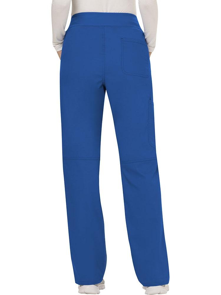Back view of an Occupational Therapy Aide  wearing a Cherokee Workwear Revolution women's Elastic Waistband Pull-On Scrub Pant in Royal Blue size extra small petite featuring a total of 4 pockets including a back patch pocket.