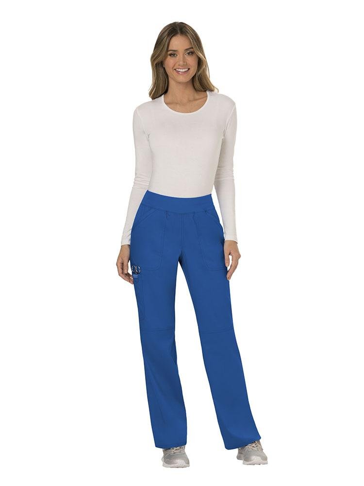 A female LPN wearing Cherokee Workwear Revolution Women's Elastic Waistband Pull-On Scrub Pant in Royal size small tall featuring an inseam of approximately 34".