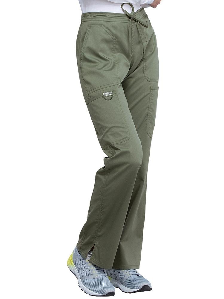 Sonographer wearing Cherokee Workwear Revolution women's Mid Rise Moderate Flare Scrub Pant in olive size 2XL