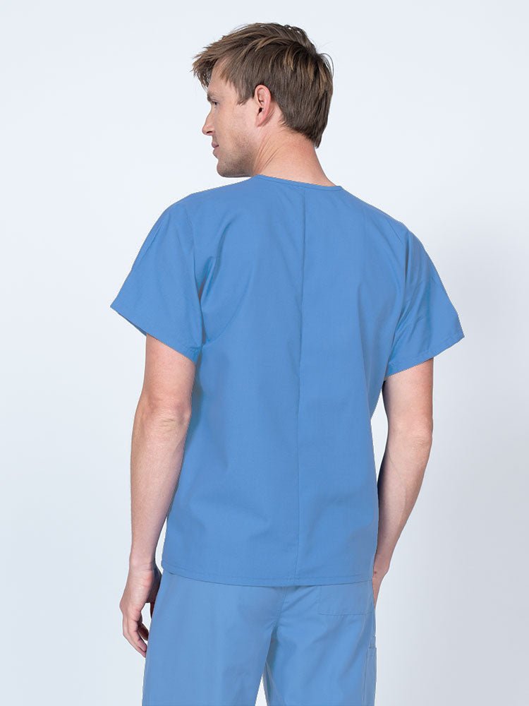 Male nurse wearing a Luv Scrubs Unisex Single Pocket V-Neck Scrub Top in ceil with a lightweight, breathable fabric made of 55% Cotton and 45% Polyester.