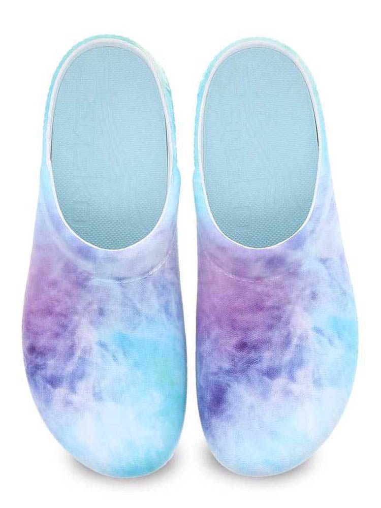 A pair of Dansko Kane Molded Nurse Clogs in Tie Dye with perforated uppers for ventilation.