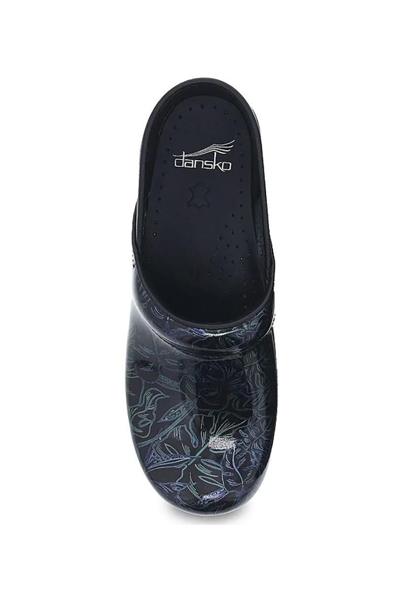 An aerial view of the Dansko Professional Nurse's Shoe in "Tropical Leaf Patent" featuring a PU outsole with a rocker bottom, offering superior shock absorption.