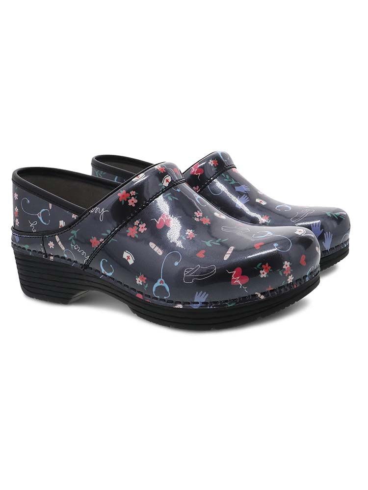 Dansko LT Pro Nurse Shoe is black with medical symbols and flowers all over.