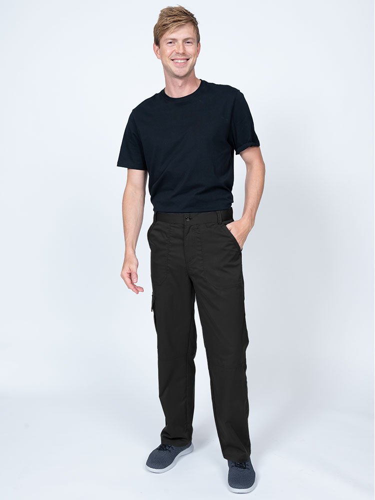 Male nurse practitioner wearing The Men's Button Front Scrub Pant from Epic by MedWorks in black.