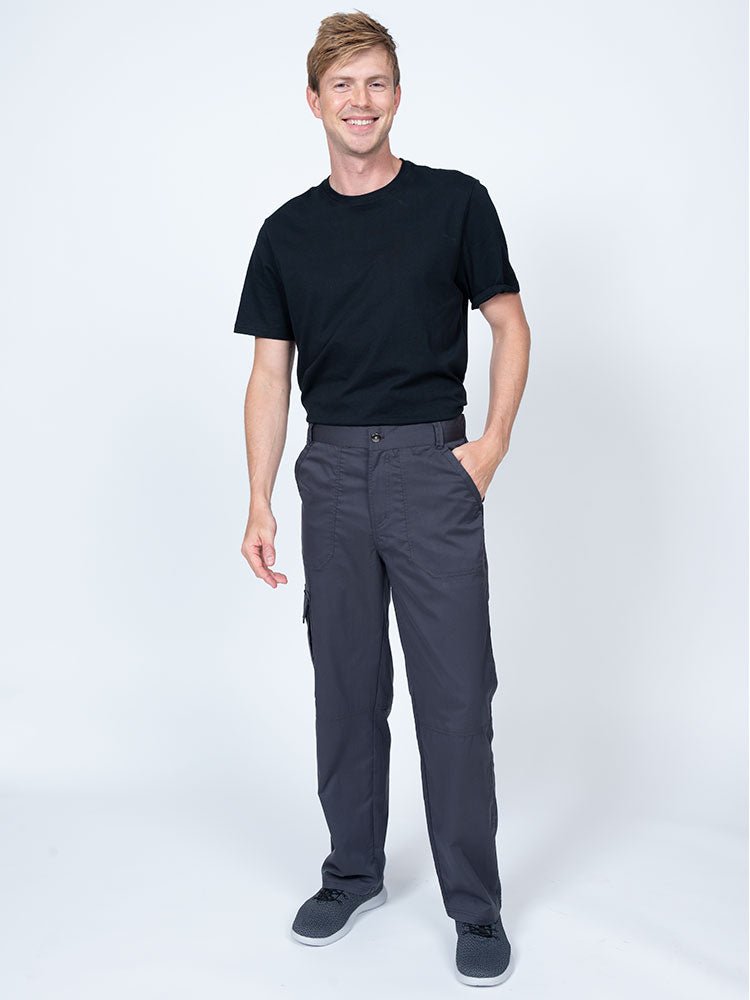 Male nurse practitioner wearing The Men's Button Front Scrub Pant from Epic by MedWorks in pewter.