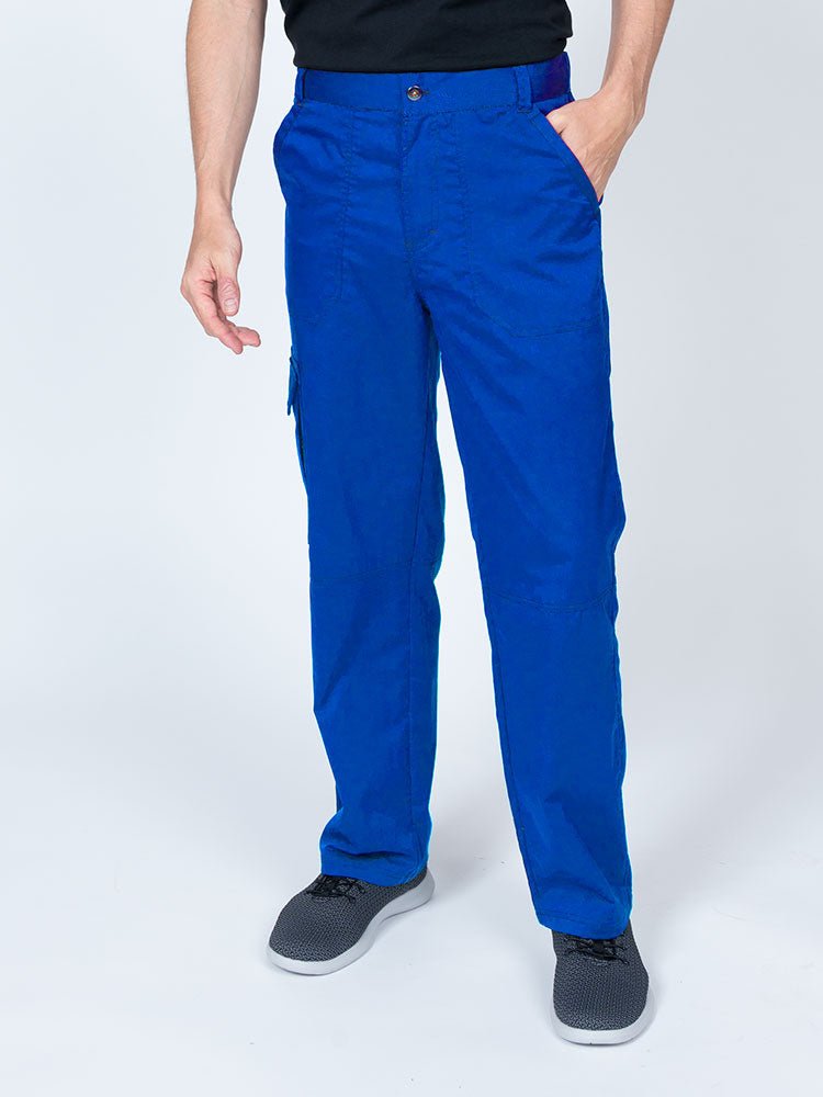 Man wearing an Epic by MedWorks Men's Button Front Scrub Pant in royal with metal button front closure.