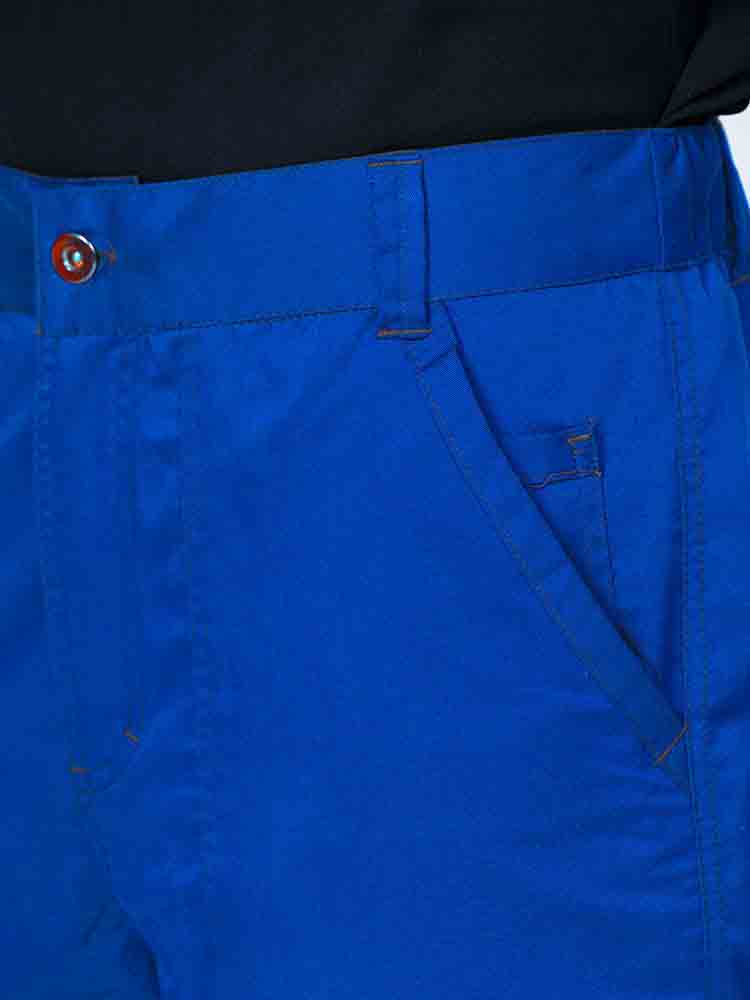 Man wearing an Epic by MedWorks Men's Button Front Scrub Pant in royal with a 6 belt loop waistline.