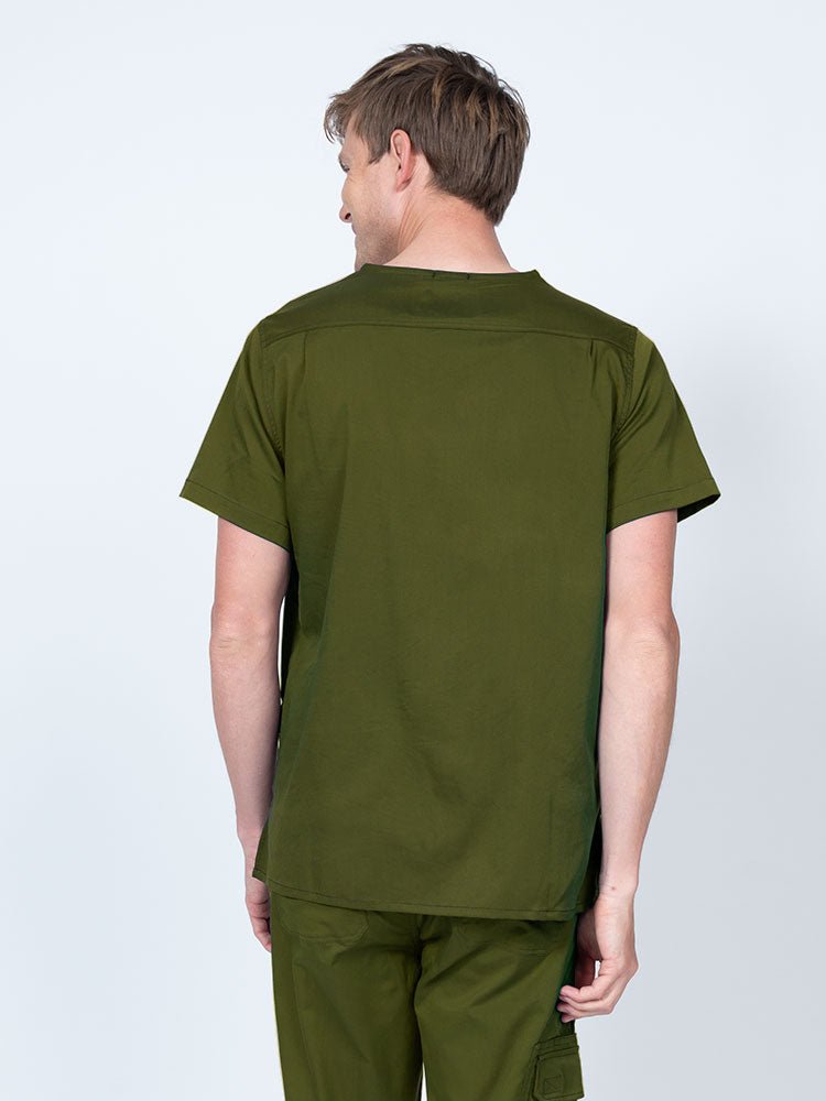 Male nurse wearing an Epic by MedWorks Men's Scrub Top in olive with a back yoke to keep a form-fitting look.
