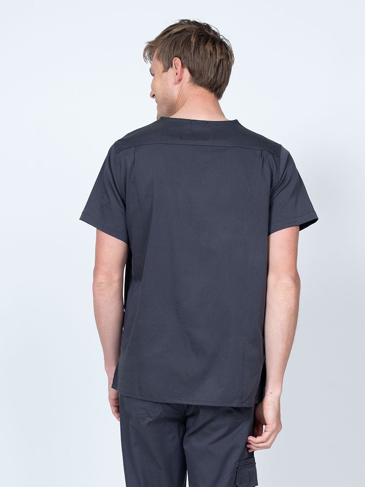 Male nurse wearing an Epic by MedWorks Men's Scrub Top in pewter with a back yoke to keep a form-fitting look.