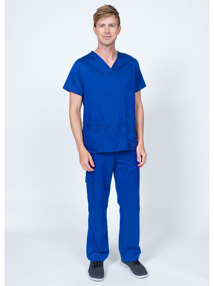 Man wearing an Epic by MedWorks Men's Scrub Top in royal with a super soft, 2-way stretch fabric.