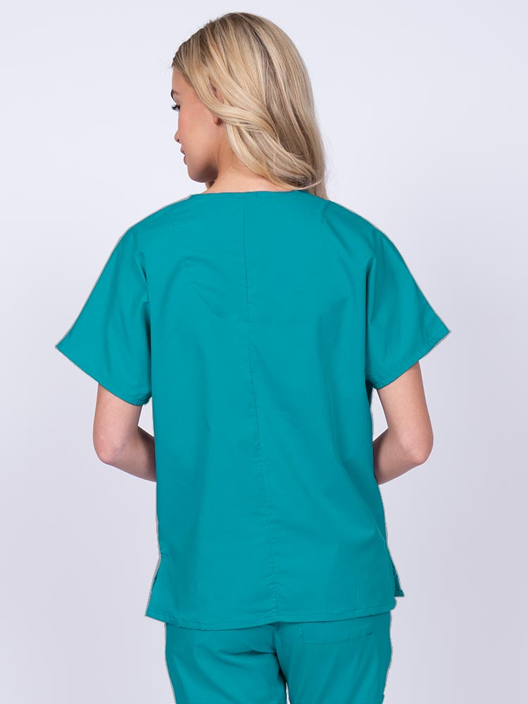 Woman wearing an Epic by MedWorks Unisex V-Neck Scrub Top in teal with a center back length of 27.5".