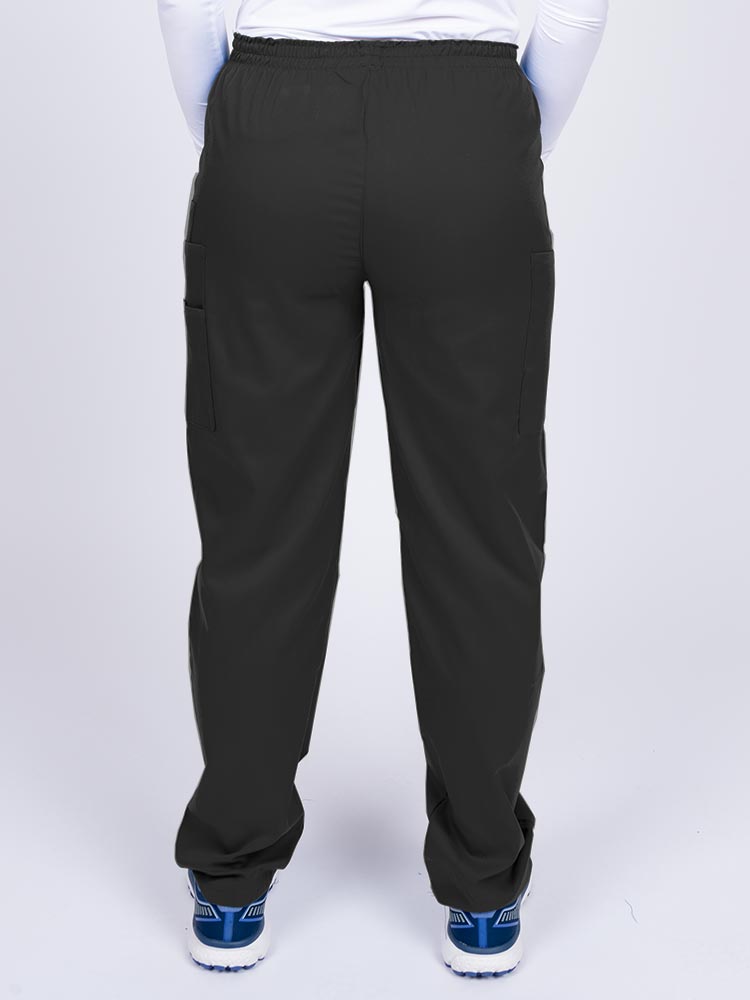 Nurse wearing an Epic by MedWorks Women's Elastic Waist Scrub Pant in black with an innovative stretch fabric designed to move with you all day.