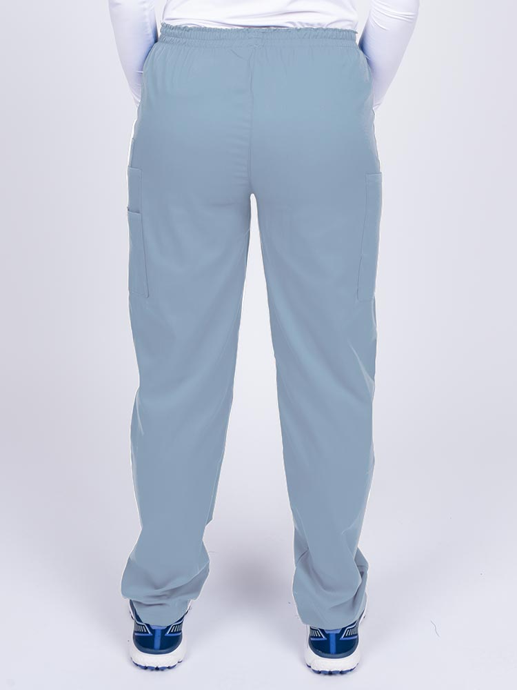 Nurse wearing an Epic by MedWorks Women's Elastic Waist Scrub Pant in blue fog with an innovative stretch fabric designed to move with you all day.
