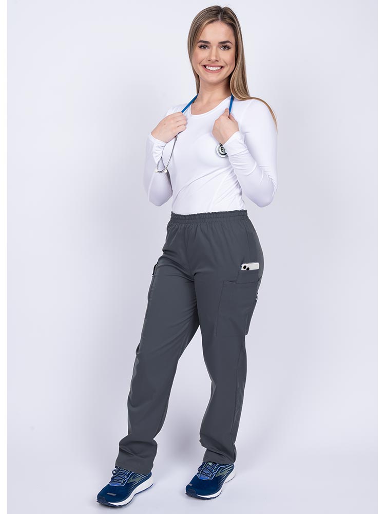 Healthcare worker wearing an Epic by MedWorks Women's Elastic Waist Scrub Pant in pewter with 1 cell phone pocket & and 1 pen slot.