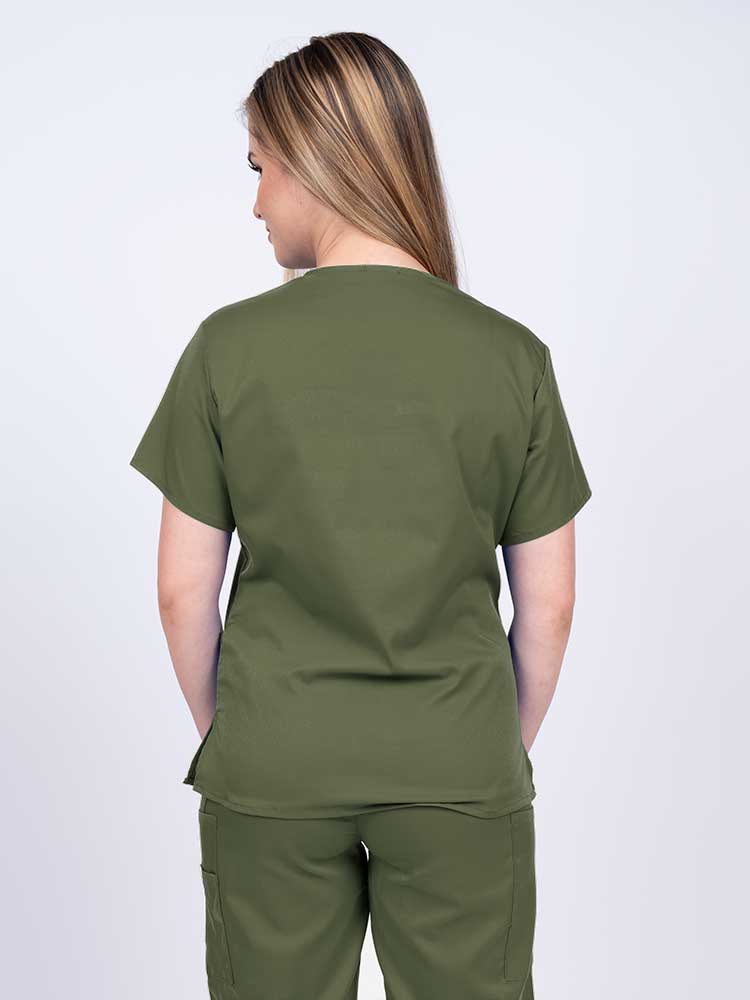 Woman wearing an Epic by MedWorks Women's Y-Neck Scrub Top in olive with a center back length of 26".