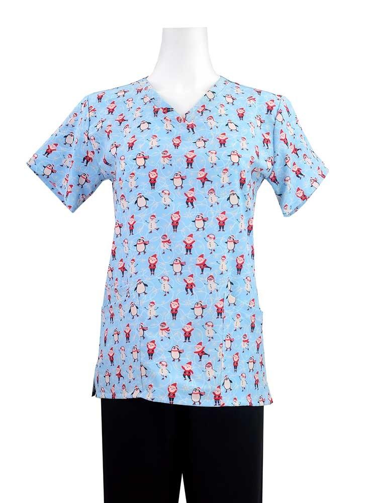 Essentials Women's Holiday Scrub Top in Skating Friends print features a tapered fit and spandex for stretch