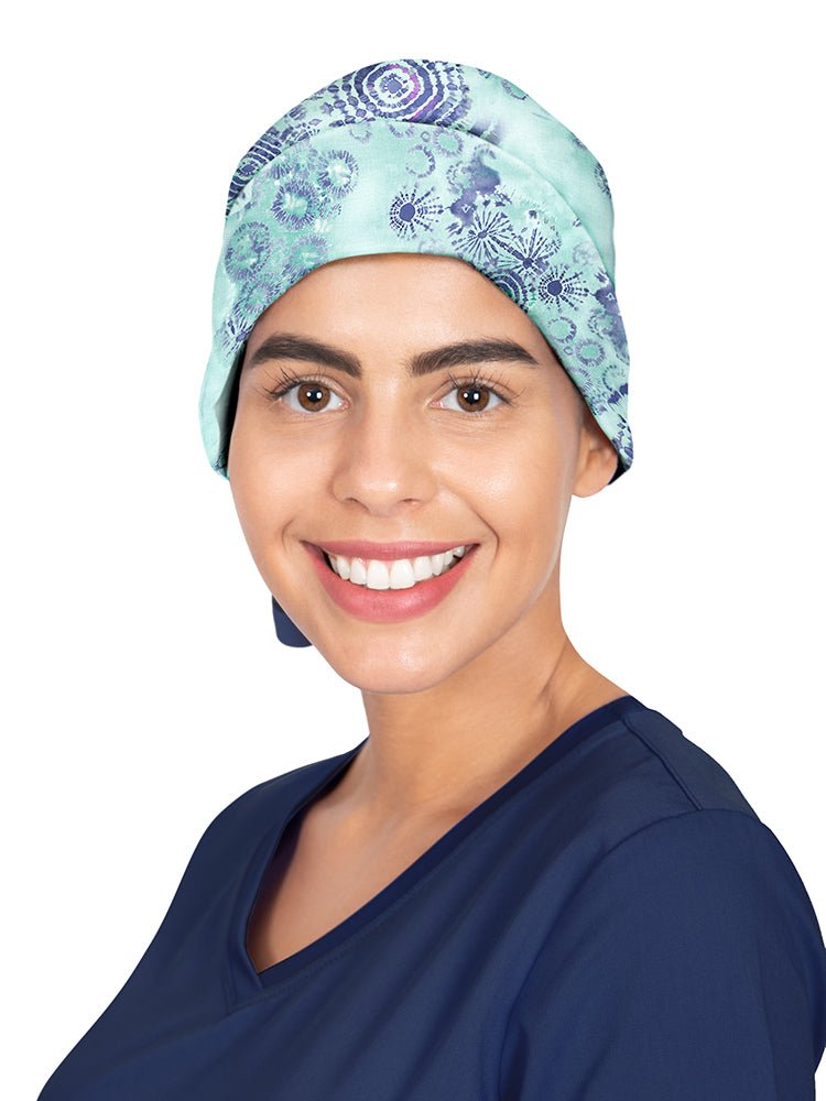 Surgical Assistant wearing Healing Hands Bouffant Scrub Cap in Hand Tie-Dyed print