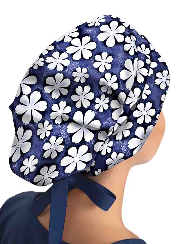Healing Hands Bouffant Scrub Cap in Just Daisies print has an adjustable toggle for comfort