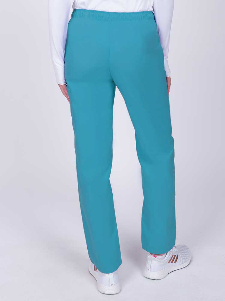 Nurse wearing a Luv Scrubs by MedWorks Women's Elastic Waist Cargo Pant in turquoise with an elastic and drawstring waist.