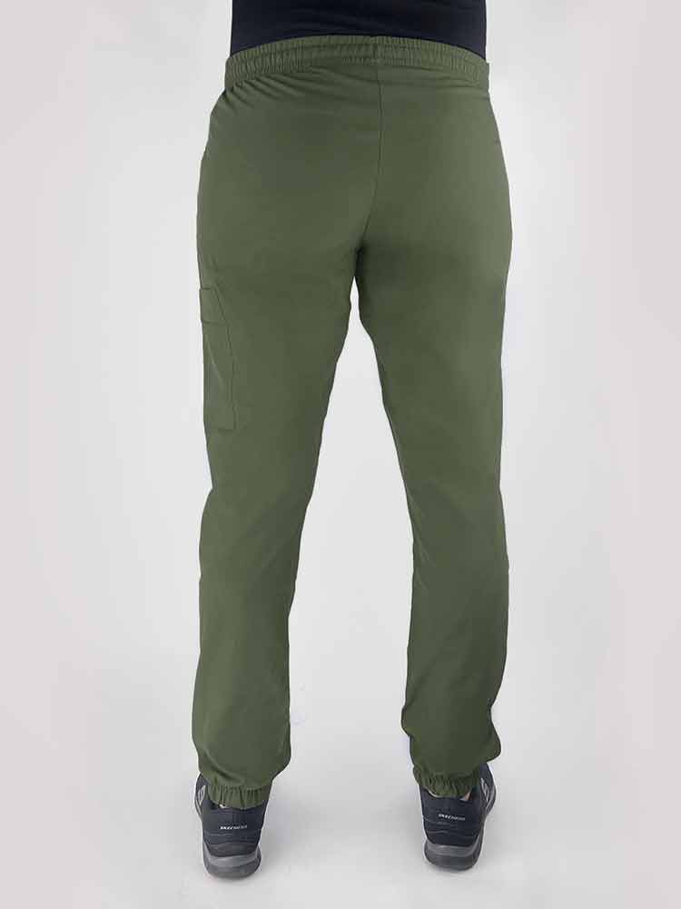 Young woman wearing a Luv Scrubs by MedWorks Women's Scrub Jogger in olive with an elastic, drawstring waist.