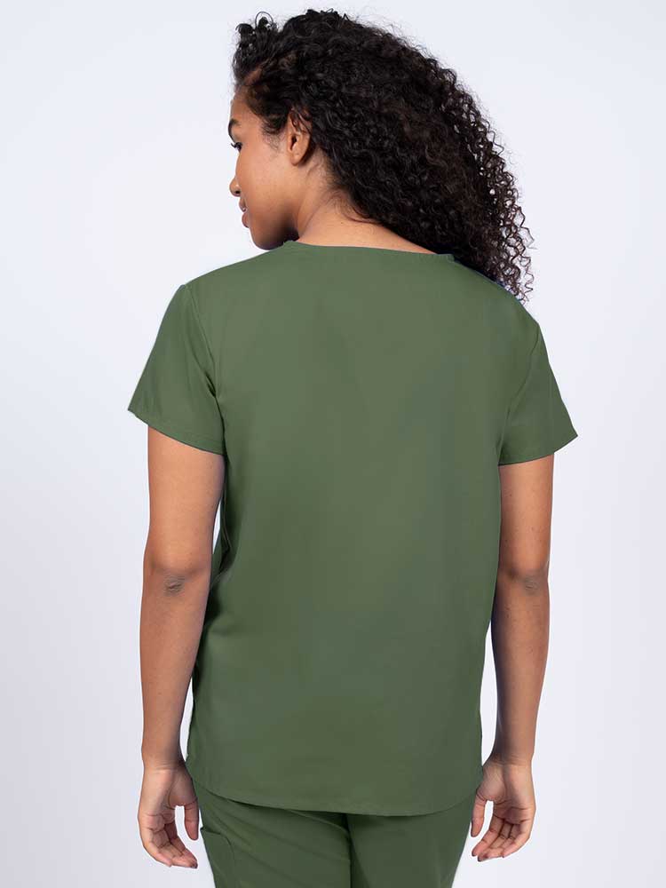 Woman wearing a Luv Scrubs by MedWorks Women's V-neck Scrub Top in olive with a center back length of 26".