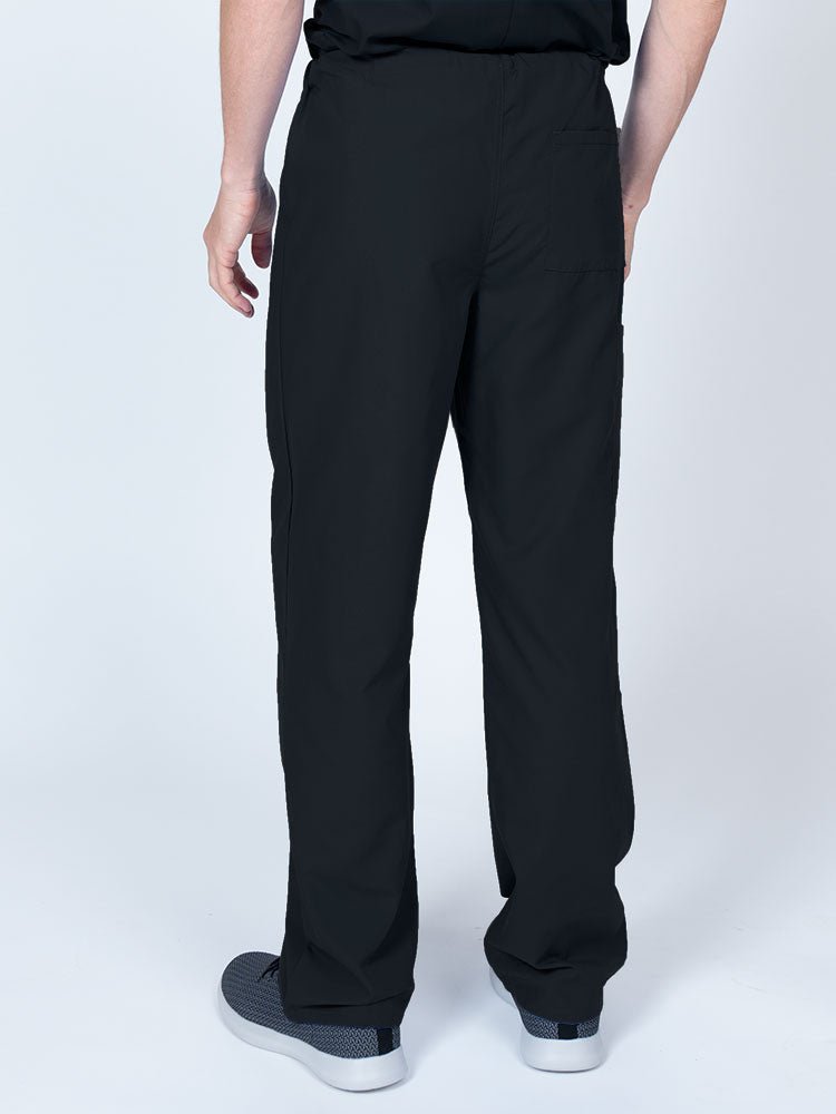 Male nurse wearing a Luv Scrubs Unisex Drawstring Cargo Pant in black featuring a lightweight, breathable fabric.