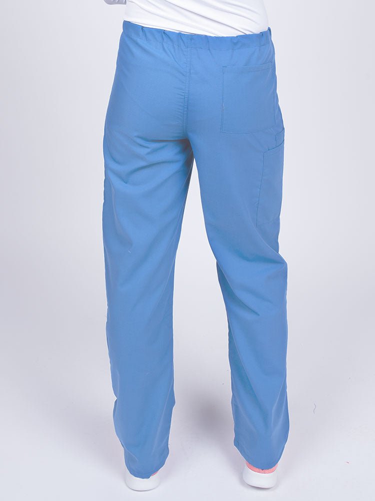 Woman wearing a Luv Scrubs Unisex Drawstring Cargo Pant in ceil with one back pocket on the wearer's right side.