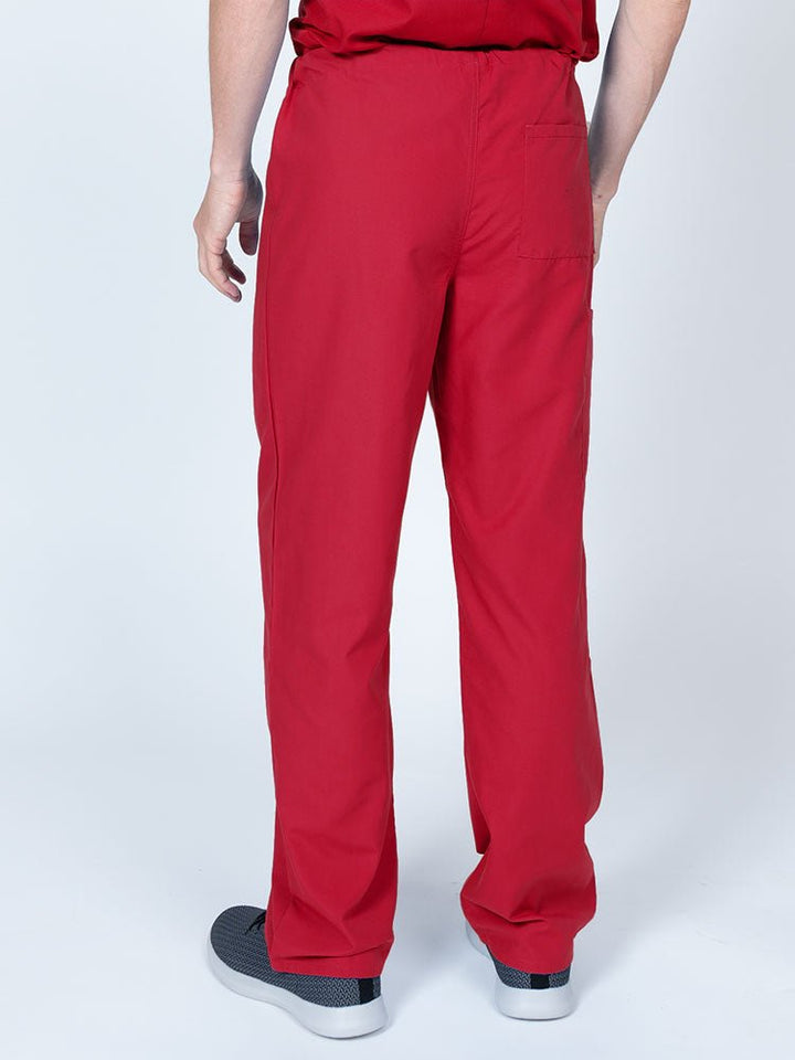 A young male Radiologist nurse wearing a Luv Scrubs Unisex Drawstring Cargo Pant in Red featuring a lightweight, breathable fabric.