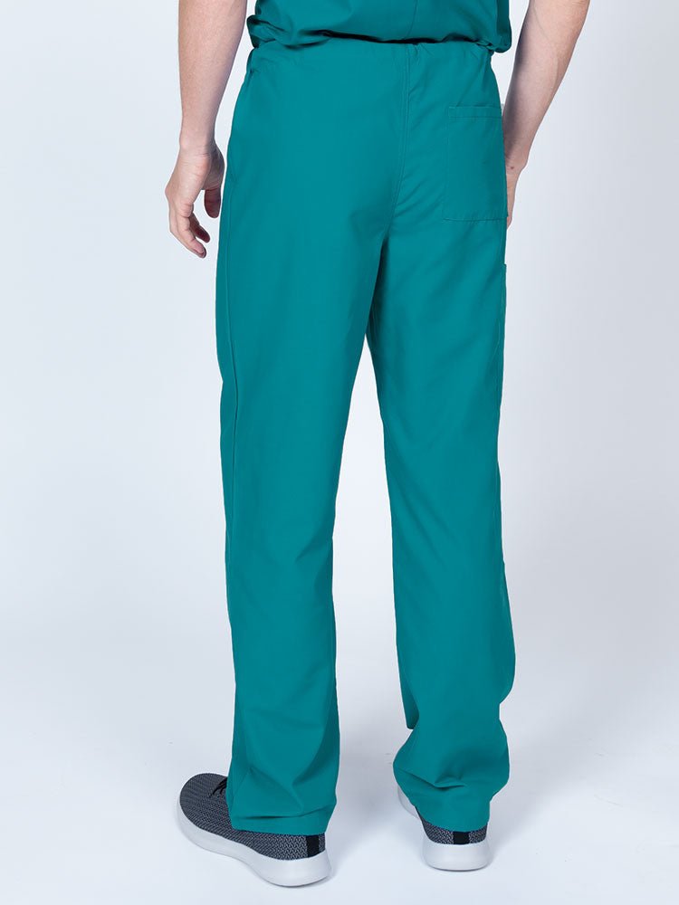 Male nurse wearing a Luv Scrubs Unisex Drawstring Cargo Pant in teal featuring a lightweight, breathable fabric.