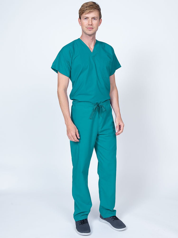 Man wearing a Luv Scrubs Drawstring Cargo Pant in teal featuring a unisex fit.