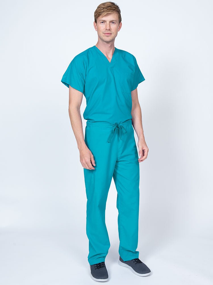 Man wearing a Luv Scrubs Drawstring Cargo Pant in turquoise featuring a unisex fit.