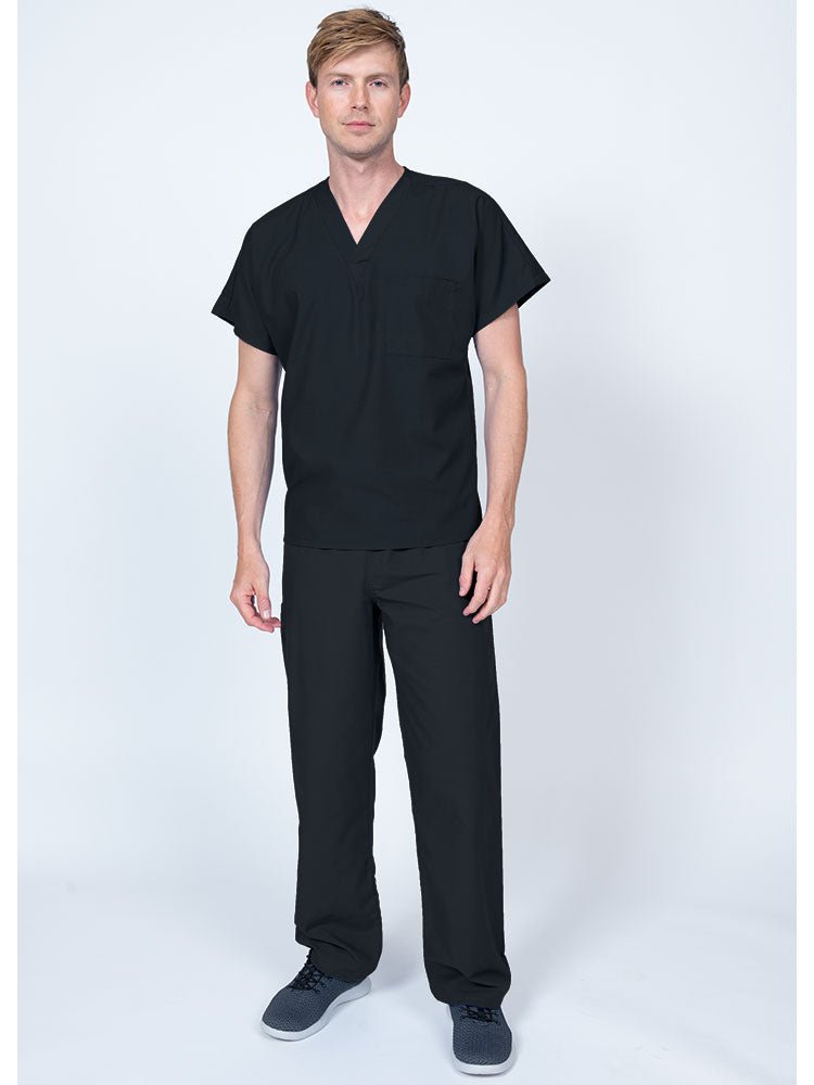 A young male Home Health Aide wearing a Luv Scrubs Single Pocket V-Neck Scrub Top in Black featuring a unisex fit.