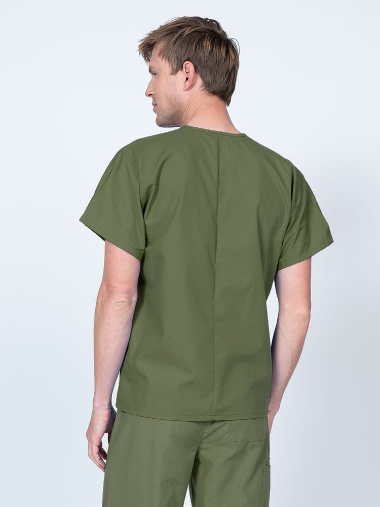 Male nurse wearing a Luv Scrubs Unisex Single Pocket V-Neck Scrub Top in olive with a lightweight, breathable fabric made of 55% Cotton and 45% Polyester.