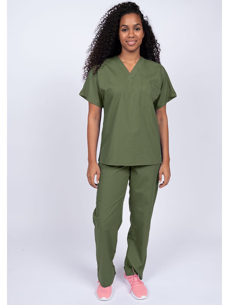 Young woman wearing a Luv Scrubs Unisex Single Pocket Scrub Top in olive featuring a V-neckline.